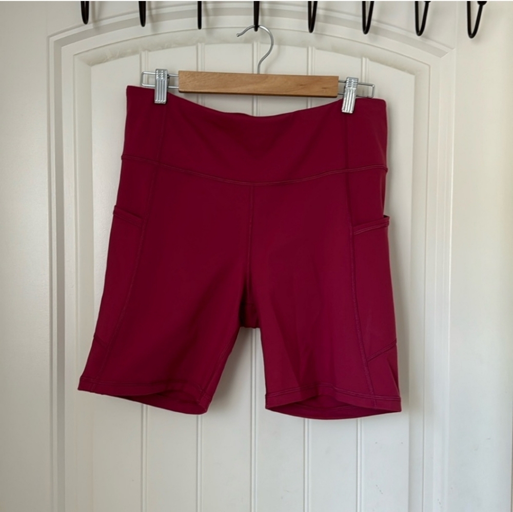 Gap Fit berry pink 6” inseam active shorts with side pockets. Size L
